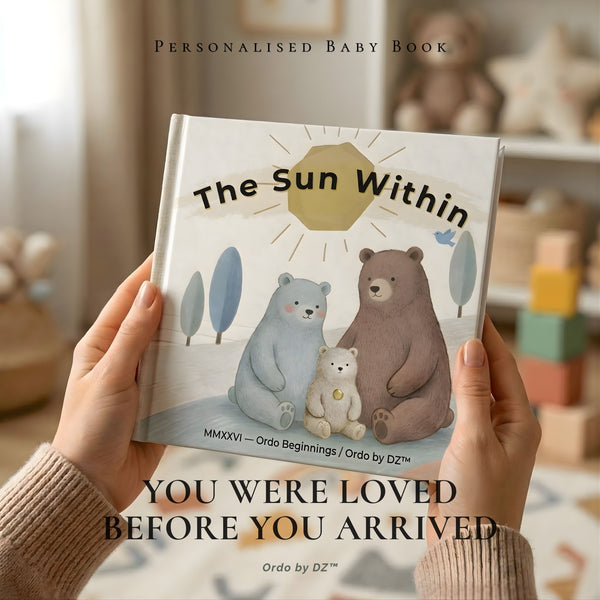 Person holding a book titled 'The Sun Within' with bear illustrations on a blurred indoor background.