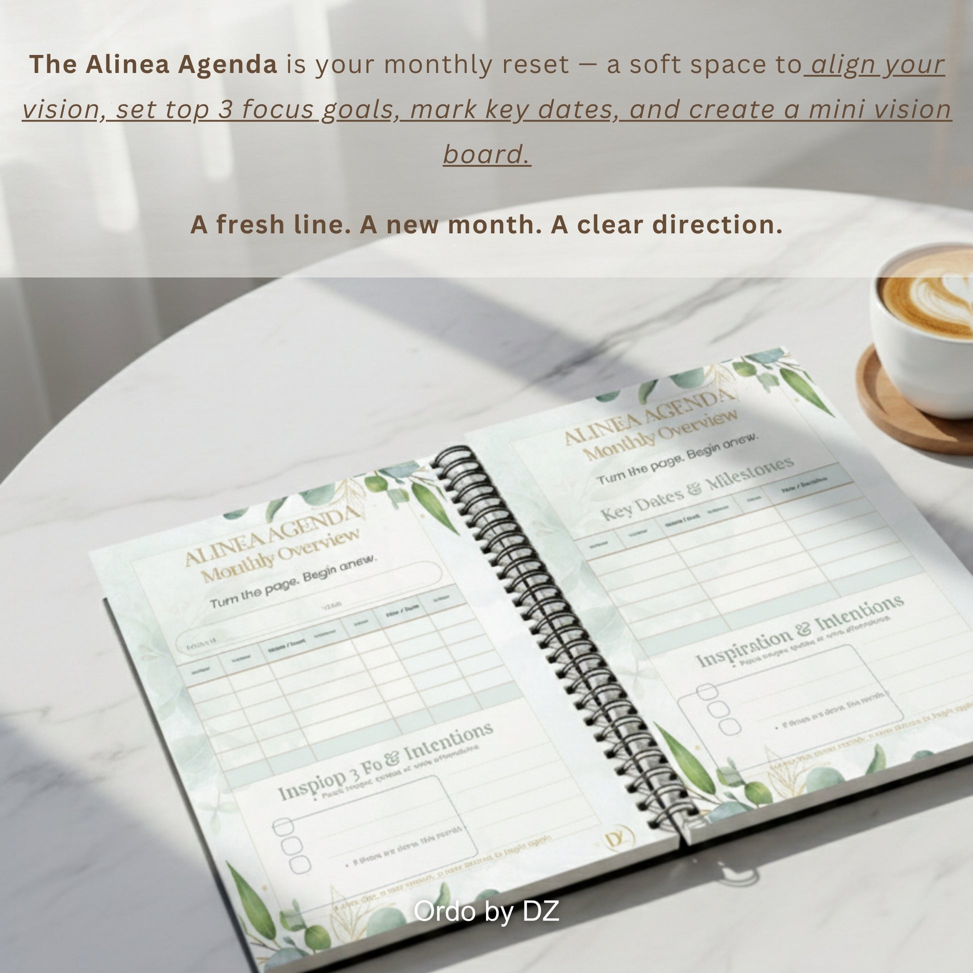Open Ordo planner 'Alinea Agenda' on a marble surface with a cup of coffee. Front pages