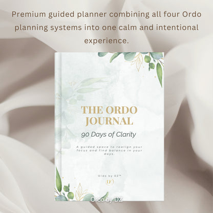 The Ordo Journal book on a soft fabric background with text about the planning system. front cover