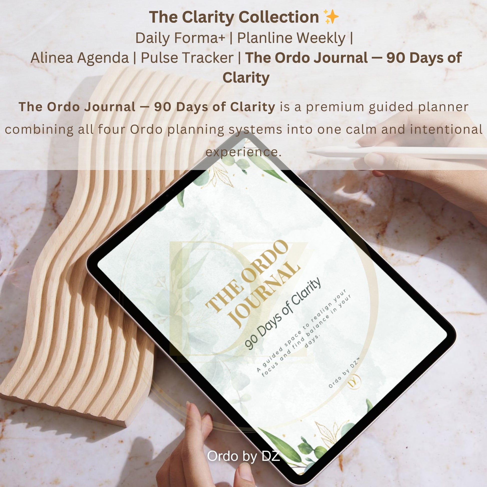 Digital tablet displaying 'The Ordo Journal - 90 Days of Clarity' on a marble surface with wooden elements. front cover