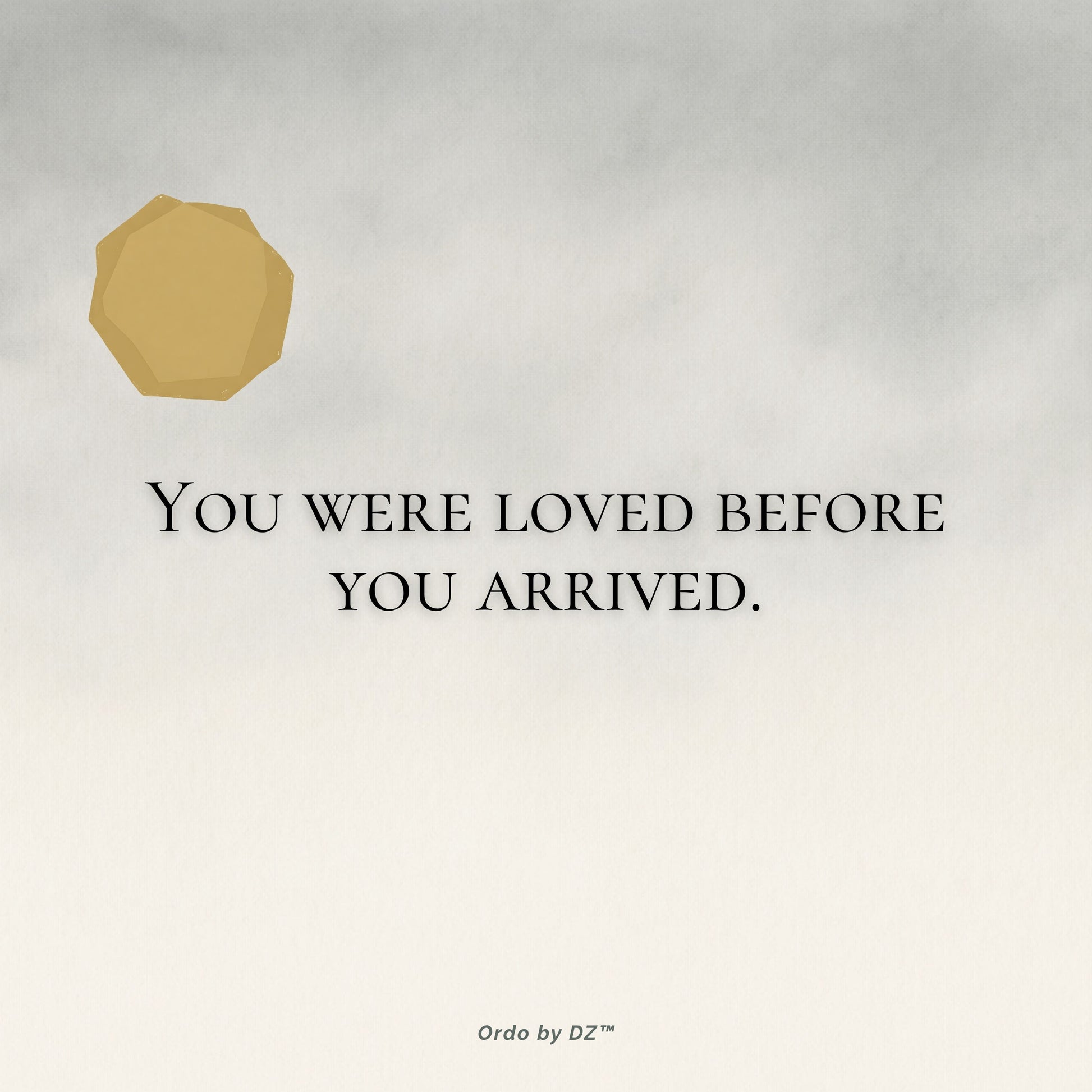 Motivational quote 'You were loved before you arrived' with a gold hexagonal logo on a light gray background.