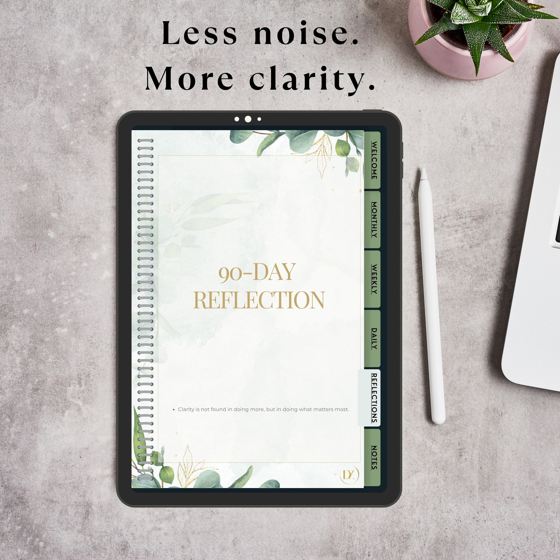90-Day Reflection planner on a tablet with text 'Less noise. More clarity.' on a gray surface.